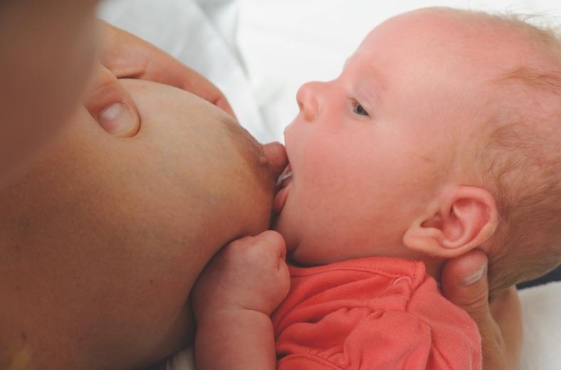 How to help your baby attach and breastfeed